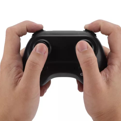 Handheld drone remote controller with two grips and curved front panel