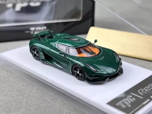 Green sports car diecast model, front three-quarter view, 1:64 scale, black wheels