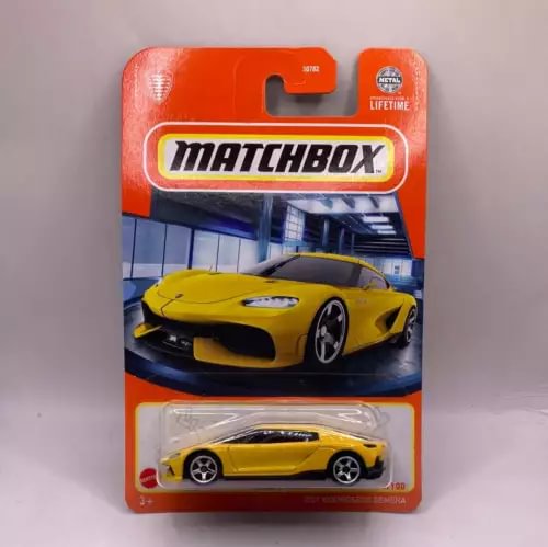 Matchbox diecast model car in blister pack with yellow sports car