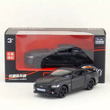 Diecast toy car model replica, black sports car with silver grille, in retail box