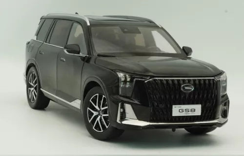 Black 1/18 scale diecast SUV model car with front grille and headlights