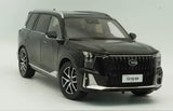 Black 1/18 scale diecast SUV model car with front grille and headlights