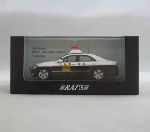 1:18 scale SUV diecast model in box, dark body with white roof
