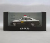 1:18 scale SUV diecast model in box, dark body with white roof