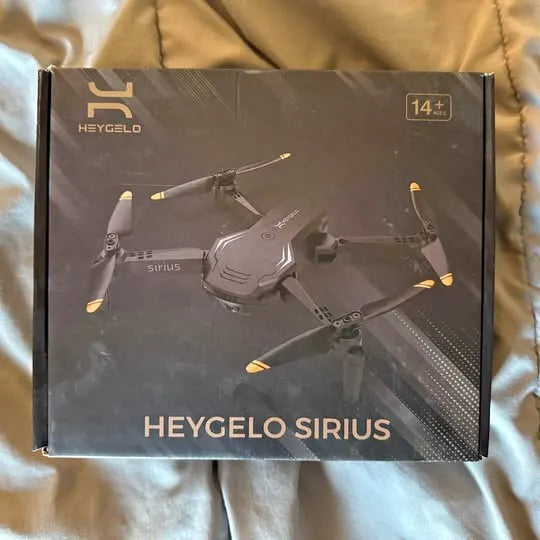 Drone product box with HEYGEL0 SIRIUS logo and printed drone illustration