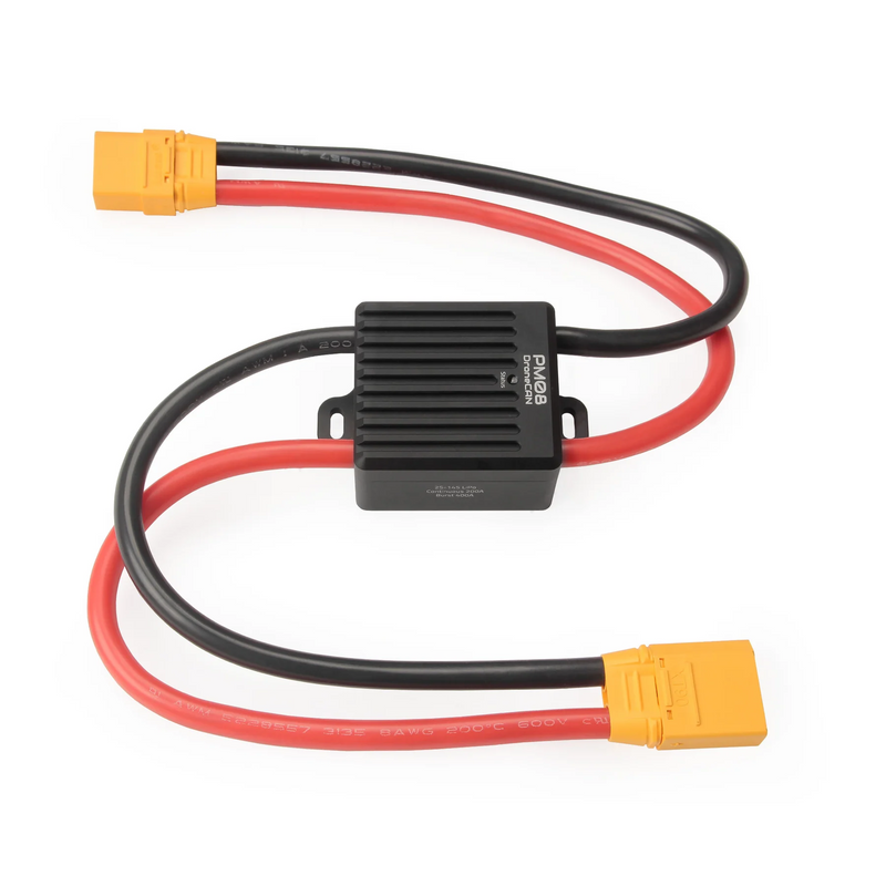 Compact DroneCAN power module with black housing and red/black wires, yellow connectors