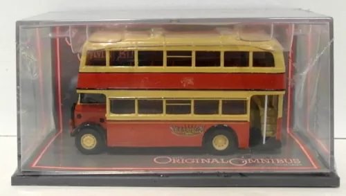 Yellow and red diecast double-decker bus model in clear display case