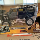 Boxed 1:24 diecast truck model with working suspension, dark gray and blue
