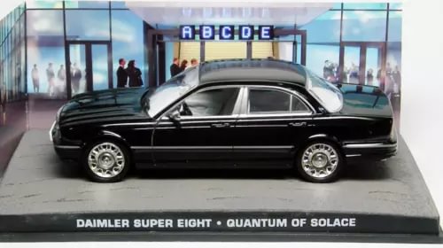 Black classic sedan diecast model car with chrome trim and silver wheels.