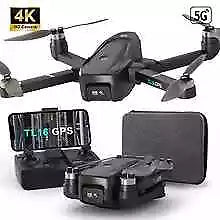 Black quadcopter drone with 4K camera, GPS, and attached remote screen