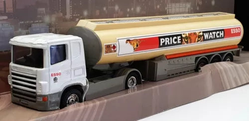 Diecast fuel tanker truck, white cab and yellow tank with Esso side graphics