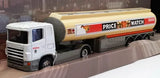 Diecast fuel tanker truck, white cab and yellow tank with Esso side graphics