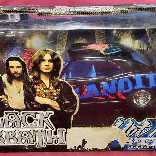 Black Sabbath diecast model car with colorful band graphics