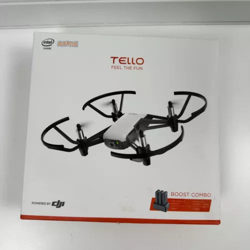 Mini quadcopter drone with four rotors and built-in camera, shown on retail box