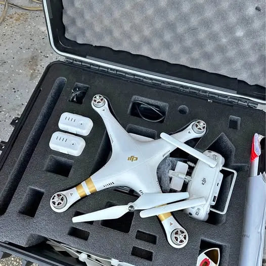 White 4K camera quadcopter drone in black hard case with accessories