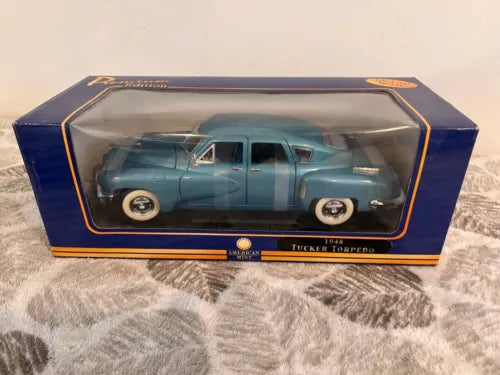 Metallic blue 1948 Tucker Torpedo diecast car model in display box