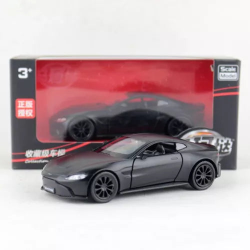 Diecast Aston Martin metal model car toy, dark gray coupe with black wheels