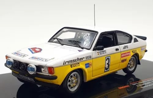 Yellow and white diecast rally car, front 3/4 view with number 3 on door