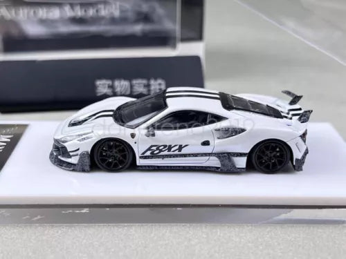 White diecast sports car model with black wheels, side view