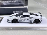 White diecast sports car model with black wheels, side view