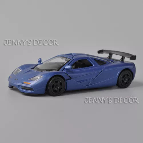 Blue McLaren F1 diecast model car toy with rear spoiler, pull-back action