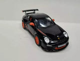 Black diecast toy sports car, open doors, front 3/4 view, orange wheels