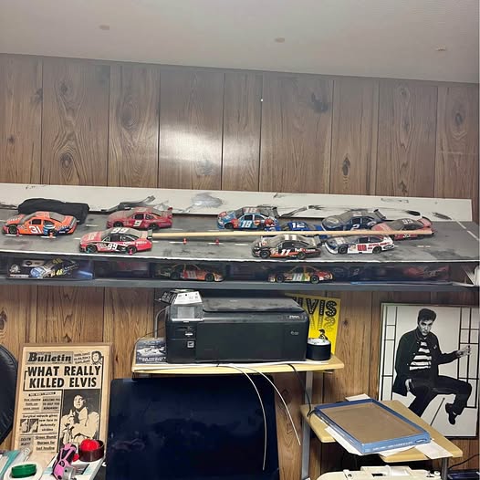 NASCAR diecast car set, multiple cars displayed on shelf