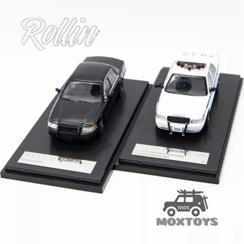 1:64 police car diecast set with black and white toy vehicles on display bases