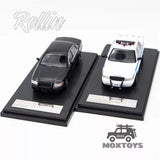 1:64 police car diecast set with black and white toy vehicles on display bases