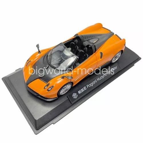 Orange diecast roadster model car, 1:24 scale, open cockpit on display base