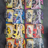 Diecast car toys in blister packs, assorted colors and designs
