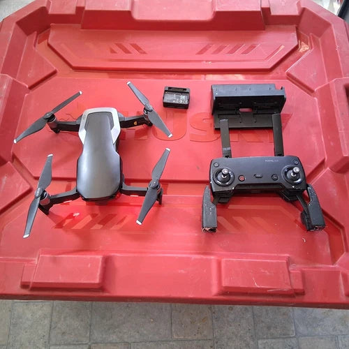 DJI Mavic Air folding drone with remote controller and spare parts in case