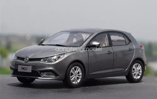 Grey MG5 1/18 die-cast model car with front 3/4 view and alloy wheels
