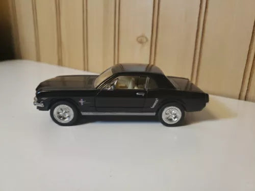Black 1964 1/2 Ford Mustang pullback diecast car, side profile
