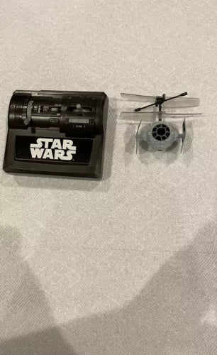 Star Wars drone toy with black launcher and small rotorcraft