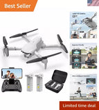 White compact quadcopter drone with controller and carry case