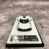 1:64 alloy diecast supercar model on display base, white with black accents