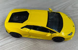 Yellow Lamborghini Huracan LP610-4 diecast car toy, 1/36 scale, side view