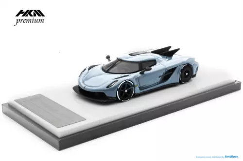 1:64 diecast sports car model in Glacier Blue with black hood and display base
