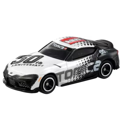 Tomica 50th Anniversary Toyota Supra GR diecast model car, white and black with racing decals