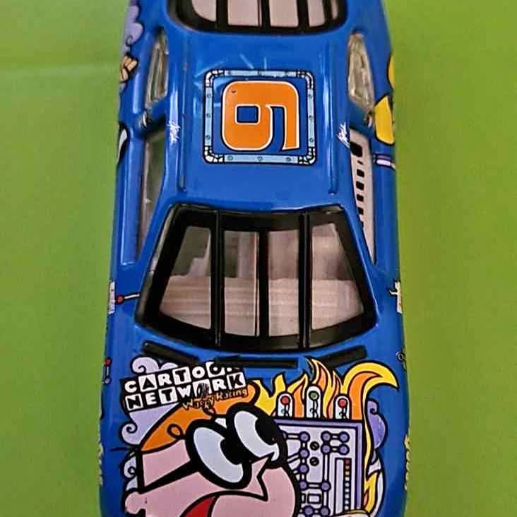 Blue NASCAR diecast race car front with Cartoon Network logo and grille