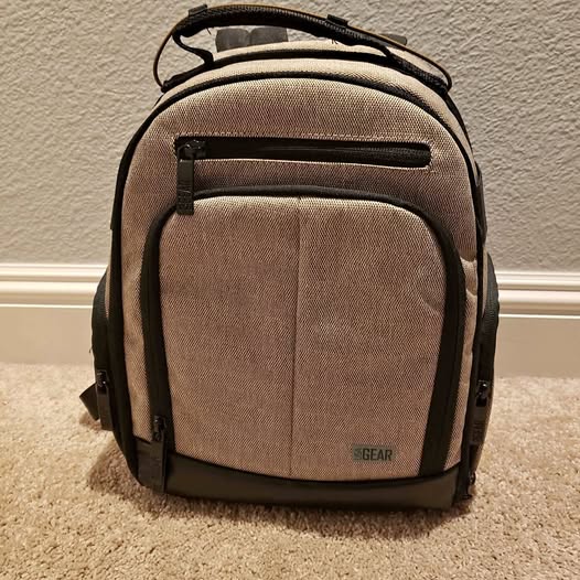 Drone backpack with front organizer pocket and USA Gear logo, dark tan fabric