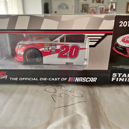 Die-cast NASCAR race car model, #20 red and white in retail box