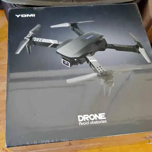Yomi drone with camera box, gray quadcopter with four propellers and landing gear