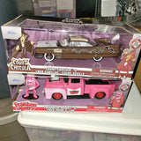 Diecast toy vehicle set in clear box, featuring a brown coupe and pink truck
