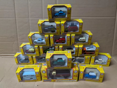 Assorted diecast car and van models in yellow retail boxes, 1:76 scale