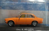 1974 Opel K180 1:43 diecast car, orange sedan in side view