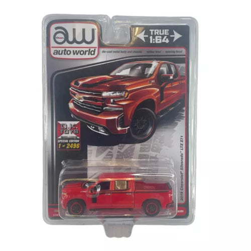 Red 1:64 pickup truck diecast model in clear blister packaging