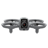 Gray mini quadcopter drone with front camera module and four propellers