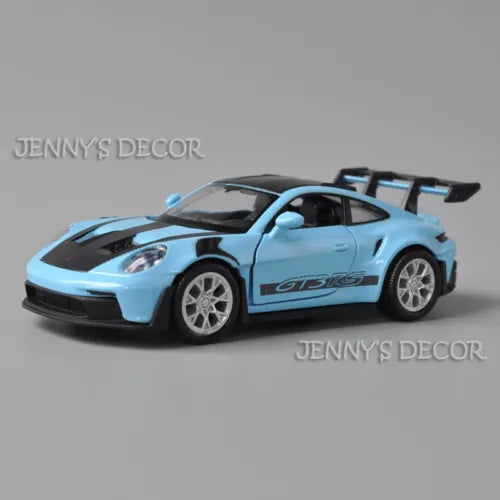 1:36 diecast model sports car in light blue with GT3 RS decals and silver wheels